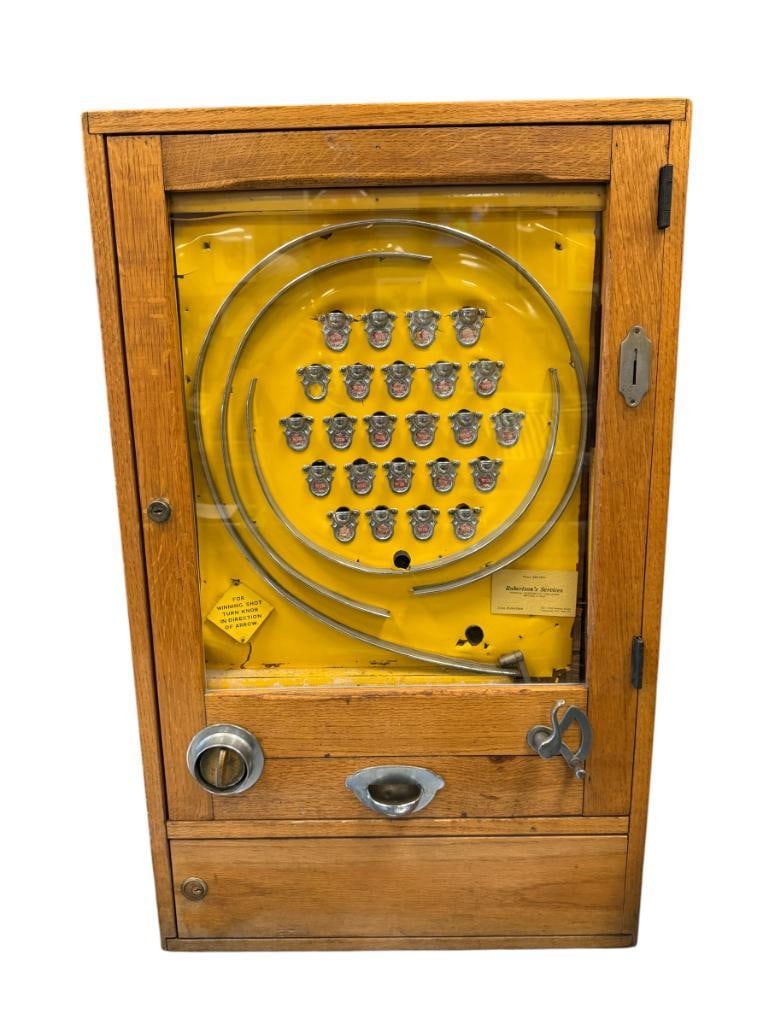 1940'S ALLWIN 24 WIN CUP MFD. BY B.M. CO. BAGATELLE-STYLE GAME COIN OPERATED BRITISH CENT: OAK CASE WITH VIBRANT YELLOW BACKGROUND, AND CHROME FINISHED HARDWARE, INCLUDES BAG OF BRITISH PENNIES 21" X 7" X 35"