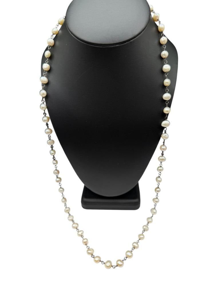 FRESHWATER PEARL NECKLACE WITH STERLING SILVER CLASP: 31", APPROX. 8MM PEARLS