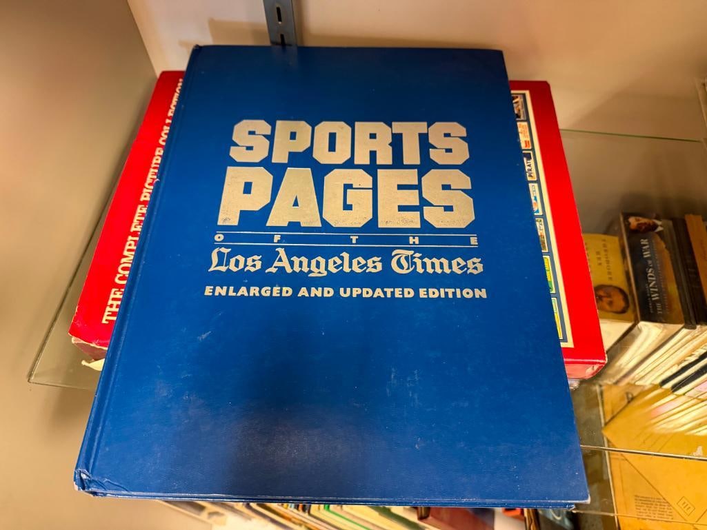FOUR SPORT THEMED HARD COVER PICTORAL BOOKS - 9