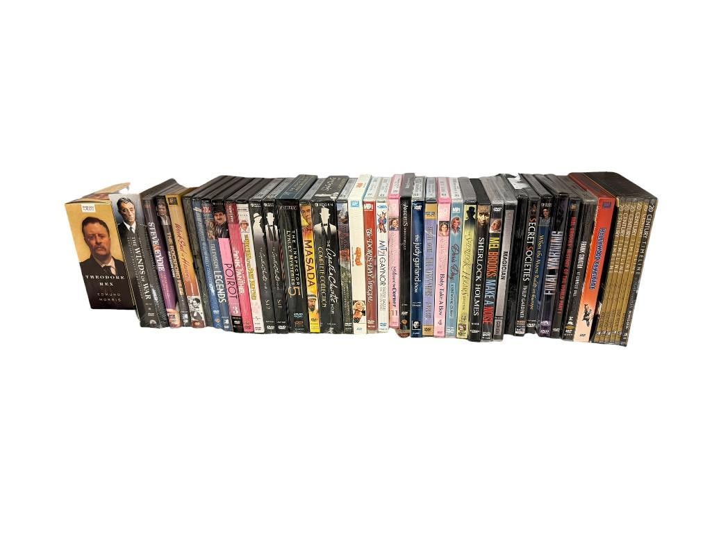 ASSORTED NEW DVDS ALL SEALED IN ORIGINAL WRAPPER: INCLUDES MOVIES, BIOGRAPHIES, EDUCATIONAL THEMES, AND MORE, SEE PHOTOS FOR TITLES