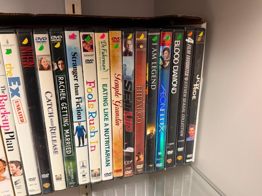 70 ASSORTED DVDS - 11
