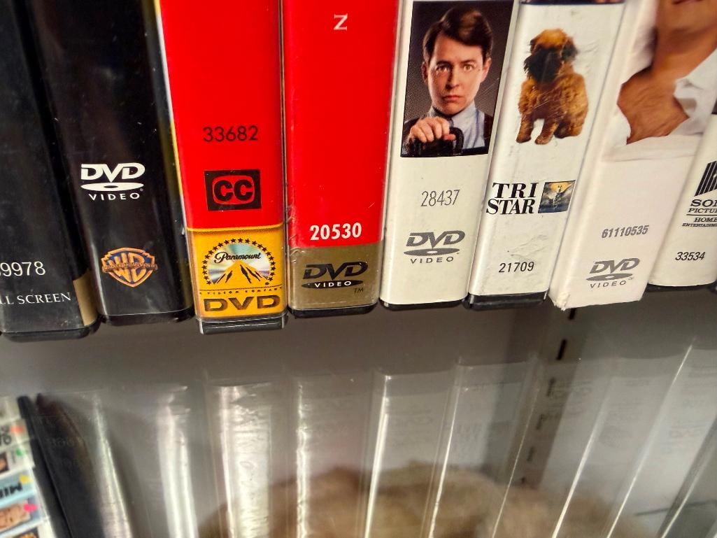 70 ASSORTED DVDS - 12