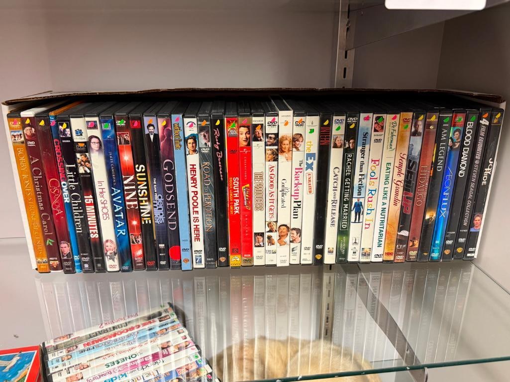 70 ASSORTED DVDS - 8
