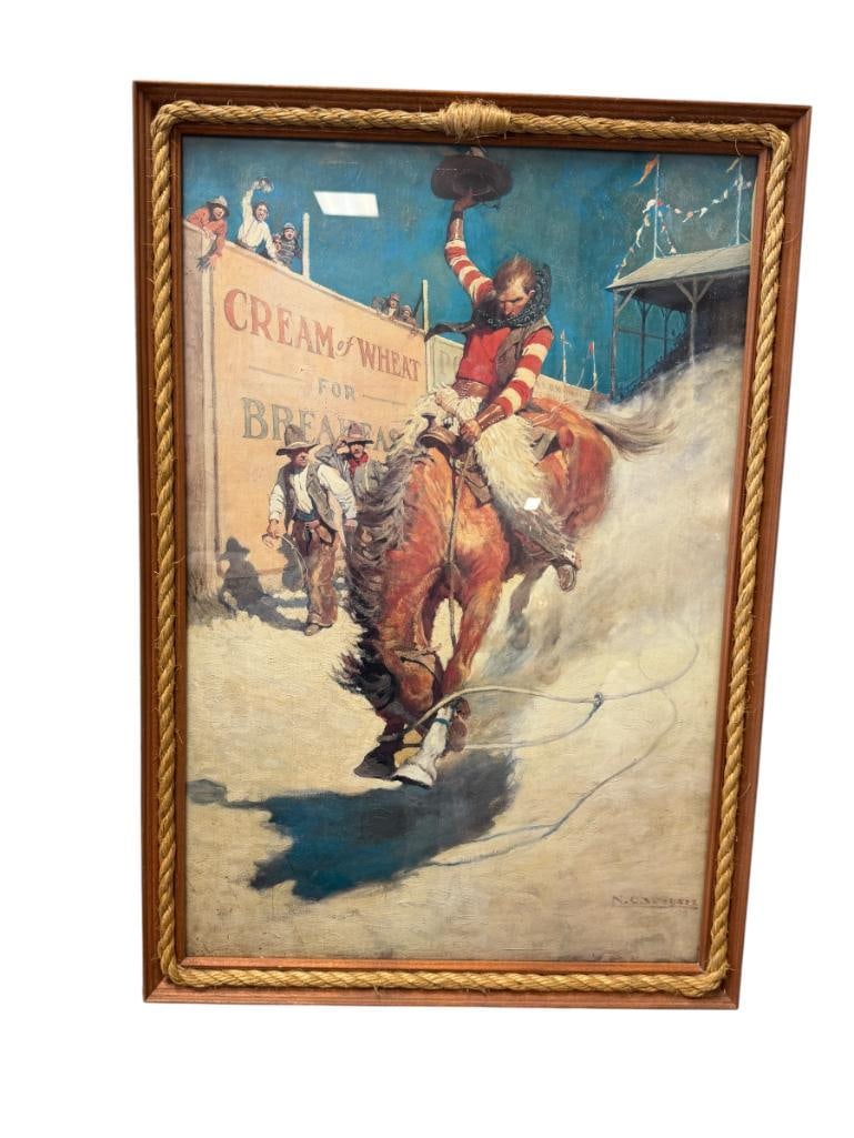 N.C. WYETH REPRODUCTION ADVERTISMENT PRINT THE BRONCO BUSTER / CREAM OF WHEAT: ART DEPICTS COWBOY ON BRONC WITH CREAM OF WHEAT ADVERTISEMENT IN THE BACKGROUND, FROM 1906 ORIGINAL PAINTING, PLATE SIGNED LOWER RIGHT, FRAMED 22 1/2" X 32 1/2" FRAME