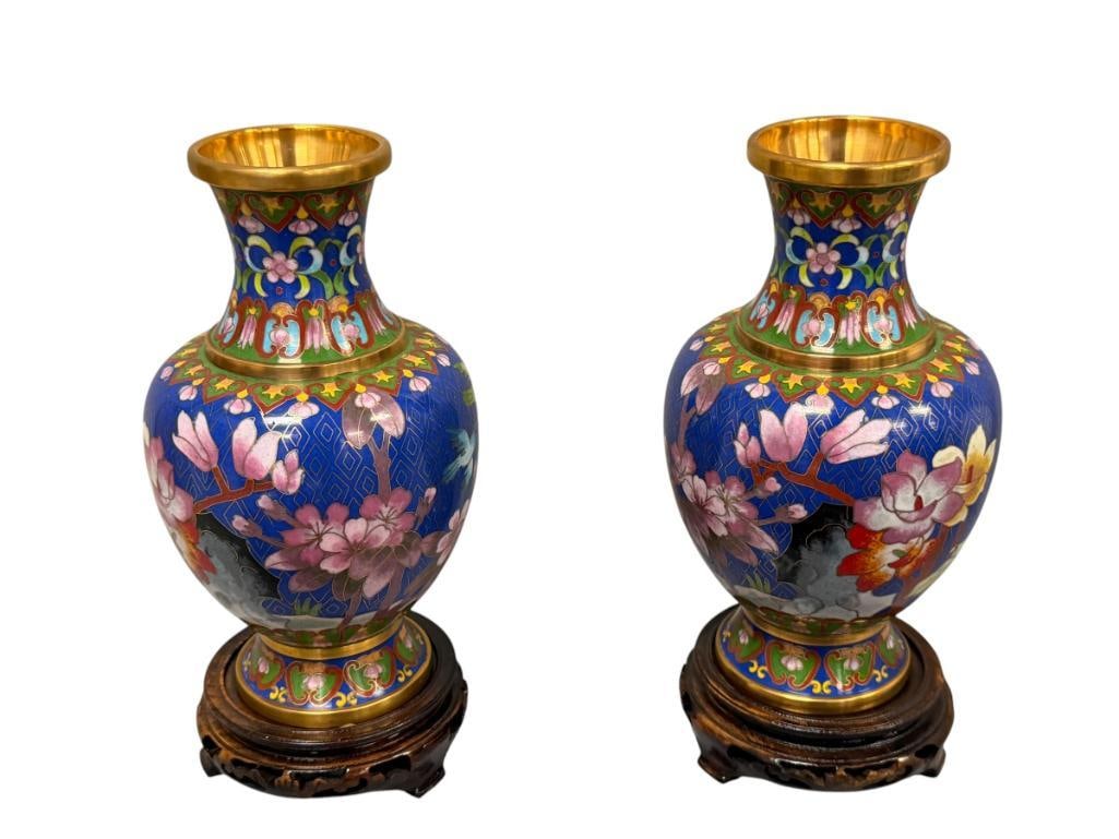 CHINESE EXPORT CLOISONNE ENAMELED VASES PEONY AND MAGNOLIA DESIGN: DIAMOND BACKGROUND, ORIGINAL RECEIPT AND SHIPPING MEMO PRESENT, PURCHASED IN 1983 FOR $300, MATCHING WOODEN BASES INCLUDED 8 1/2" H