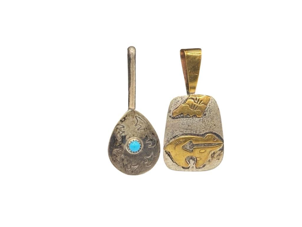 TWO NATIVE AMERICAN STERLING SILVER BEAF FETISH PENDANTS INCLUDING ONE WITH TURQUOISE: OTHER FEATURING GOLD FILLED ACCENTS, SMALL PENDANTS IS SIGNED GARCIA LARGEST IS 1 3/4", 7.48 GRAMS TOTAL