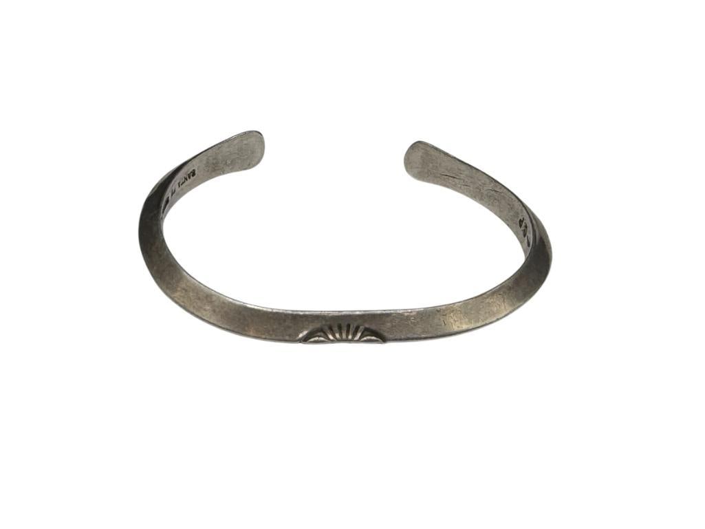 NAVAJO SANTE FE ARTIST SIGNED "~CP" STERLING SILVER CUFF BRACELET WITH ENGRAVED DESIGN: 2 3/8" CUFF WRIST WIDTH X 1/4" THICK, 22.03 GRAMS
