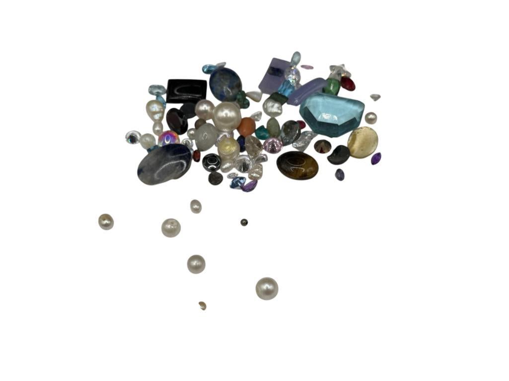 APPROX. 134CTTW OF ASSORTED LOOSE GEMSTONES AND SIMULATED GEMSTONES: INCLUDES VARIOUS CUTS, AMETHYST, CABOCHONS, BEADS, PEARLS, AND MORE 134CTTW