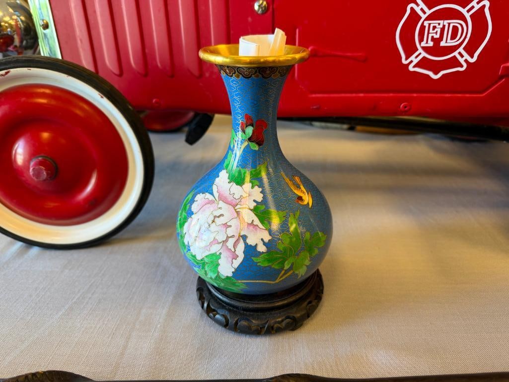 20TH CENTURY CHINESE EXPORT CLOISONNE ENAMELED VASE FLORAL DESIGN: FLORAL AND BIRD DESIGN WITH BLUE CLOUD BACKGROUND, INCLUDES WOODEN BASE, PURCHASED IN 1983 INCLUDES ORIGINAL RECEIPT 8 1/4" H