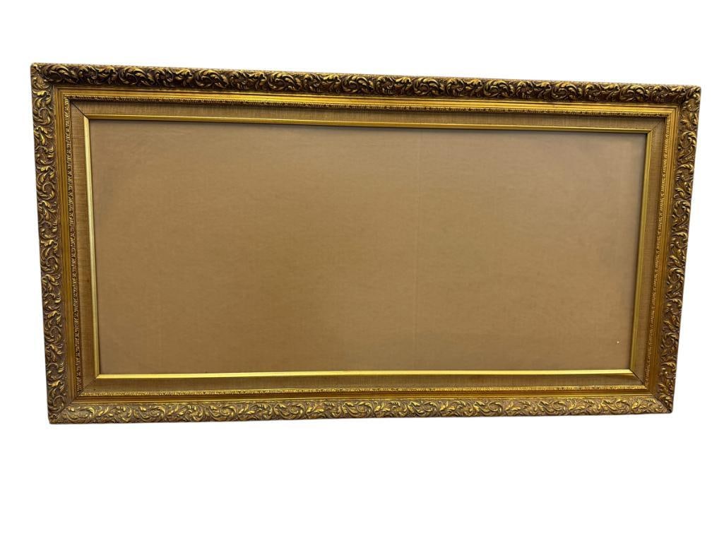 LARGE LEAF DECORATED GILT FRAME WITH GLASS (1 of 7)