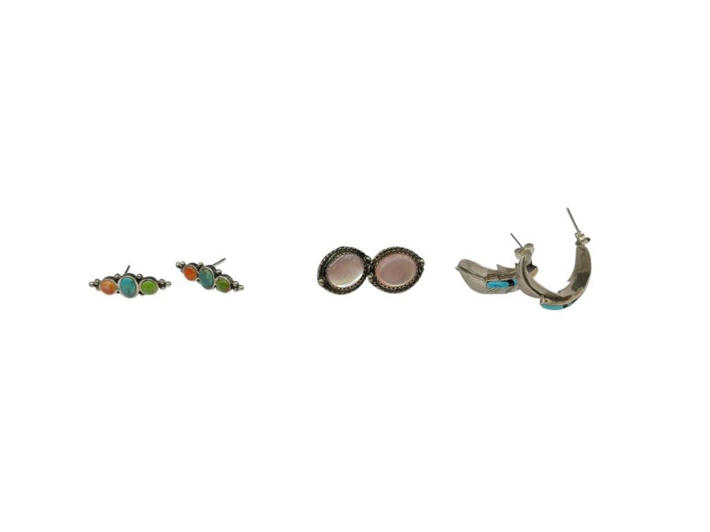 THREE PAIRS OF STERLING SILVER EARRING INCLUDING NAVAJO DESIGNS, MOTHER OF PEARL, AND TURQUOISE: INCLUDES SIGNED F. RARNEY INLAID TURQUOISE AND MOTHER PEARL FEATHER HALF HOOP EARRINGS, ALSO INCLUDES SIGNED PAIR WITH THREE CABOCHON GEMSTONES, ALL WITH STERLING SILVER BACKS LARGEST ARE 7/8", 12.10