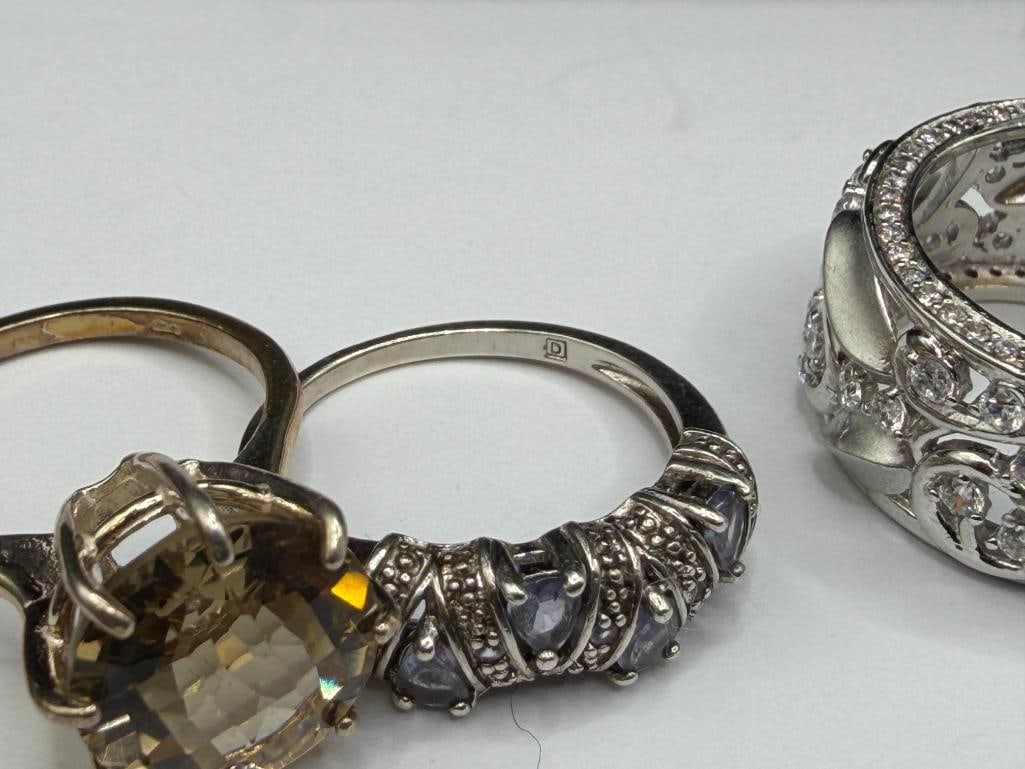10 STERLING SILVER RINGS ACCENTED WITH VARIOUS STONES AND DESIGNS INCLUDING TANZANITE AND CITRINE - 6
