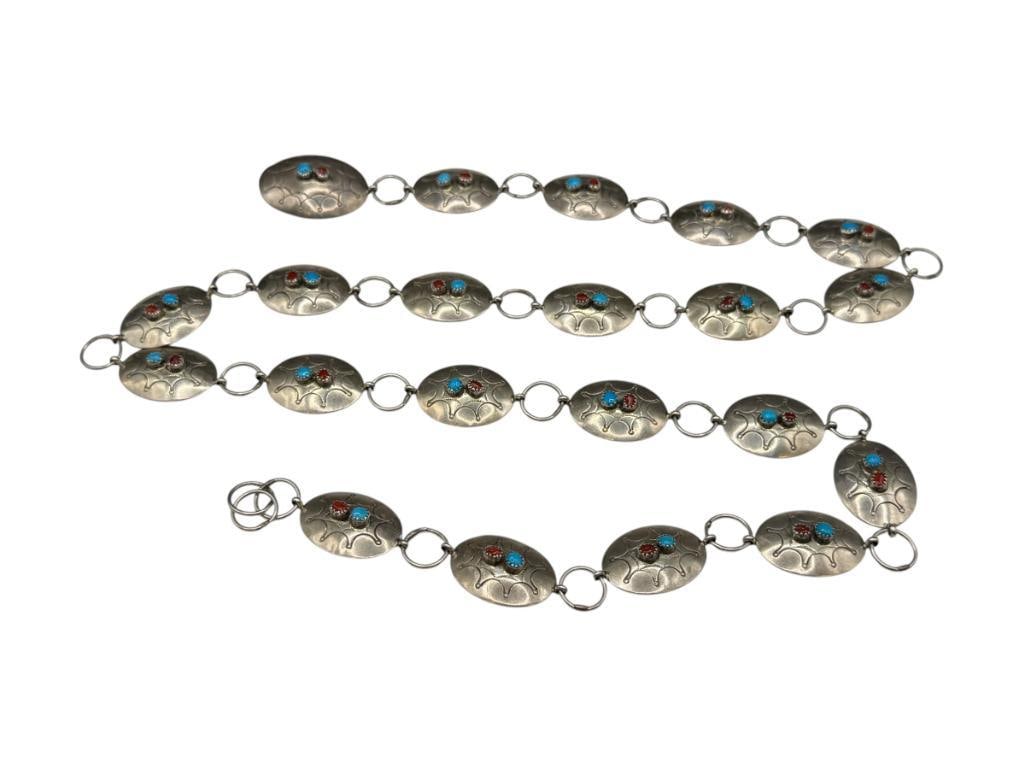 VINTAGE NAVAJO STERLING SILVER TURQUOISE AND CORAL CONCHO BELT SIGNED BY ARTIST NATHANIAL JOHNSON: OVAL SHAPED CONCHOS WITH ROUND CUT STONES, SIGNED BY ARTIST "NEL J." 37" TO 38" X 7/8", 68.64 GRAMS