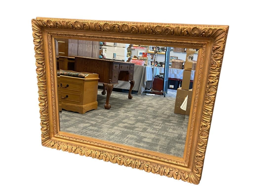 LARGE CORINTHIAN STYLED BEVELED GILDED MIRROR: LIGHT SCUFFS ON THE CORNERS 50" X 40" FRAME