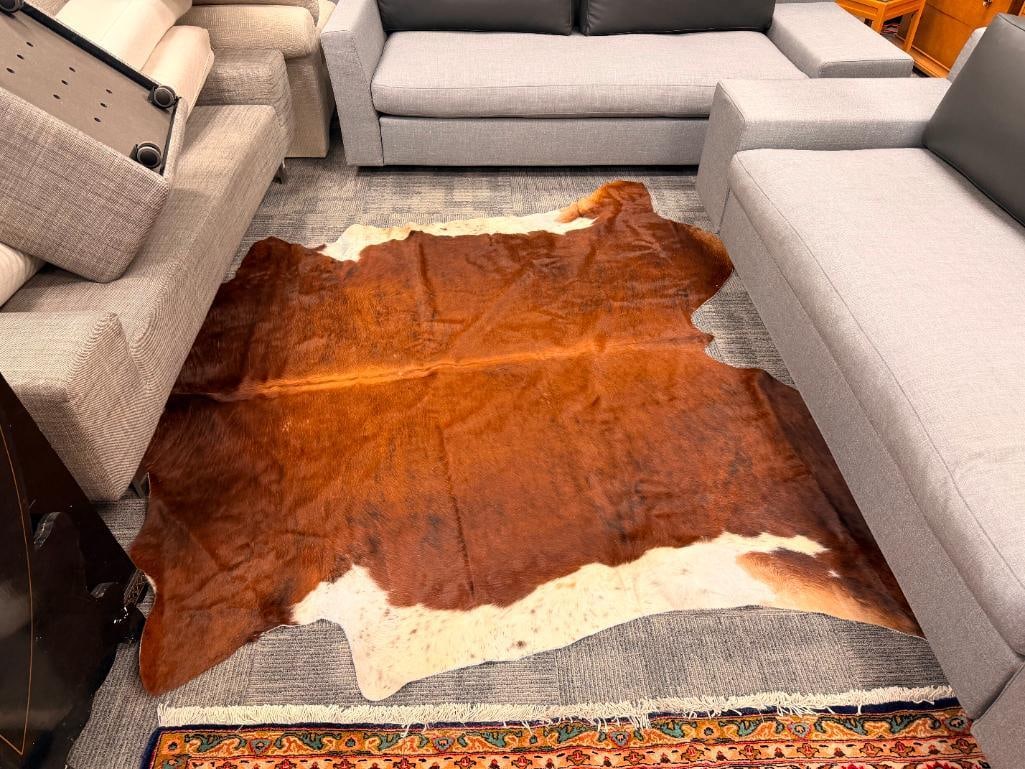 FULL BODY STEER HIDE AREA RUG: IN GOOD CONDITION NO HEAVY WEAR OR STAINS 78" X 84" 