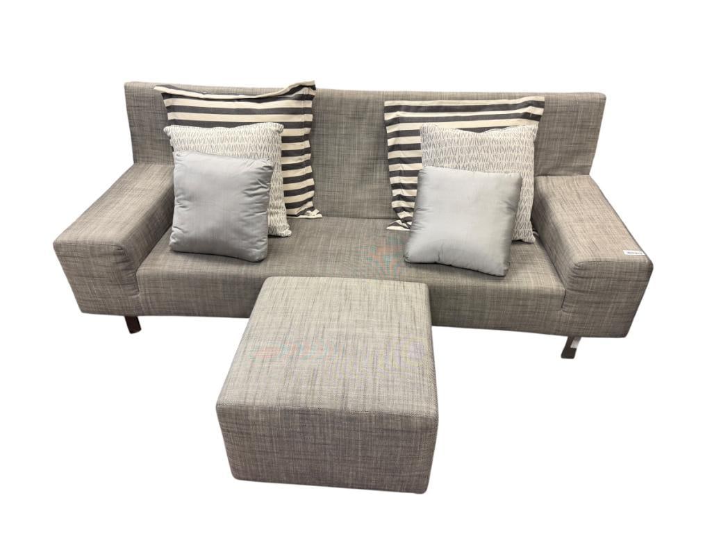 MODERN CONTEMPORARY GRAY UPHOLSTERED SOFA WITH MATCHING OTTOMAN: FEATURES CHROME FINISH METAL LEGS, INCLUDES ROLLING OTTOMAN, IN LIKE-NEW CONDITION NO HEAVY WEAR, NO STAINS, INCLUDES SIX THROW PILLOWS SOFA 80" X 32" X 32", OTTOMAN 22" X 22" X 16"
