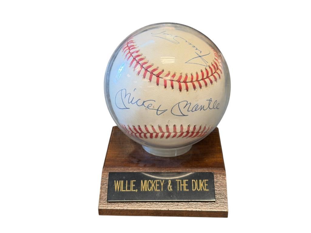 BASEBALL GREATS AUTOGRAPHED BALL BY MICKEY MANTLE, WILLIE MAYS, AND DUKE SNIDER: BALL IS SIGNED BY THREE GREATS IN BASEBALL HISTORY, SIGNED IN BLUE INK, WITH BALL DISPLAY, CERTIFICATE OF AUTHENTICITY BY THE SCORE BOARD INC. 