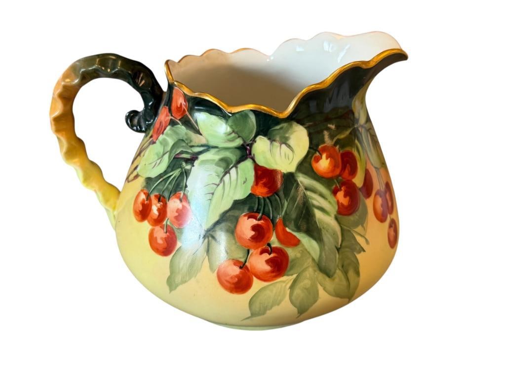 ANTIQUE HOHENZOLLERN GERMAN PORCELAIN LARGE PITCHER BERRY MOTIF: LARGE PITCHER HAND PAINTED IN GERMANY, NAMED AFTER ROYALTY LTE 19TH CENTURY EARLY 20TH CENTURY, FEATURES GILT ACCENT RIM, NO CHIPS 7" H