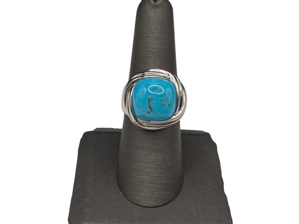 STERLING SILVER SLEEPING BEAUTY TURQUOISE DOME STYLE RING: FEATURING CUSHION SHAPED SLEEPING BEAUTY TURQUOISE WITH RIBBED DESIGN AROUND STONE, DESIGNER HALLMARKED "JS", STAMPED "THAILAND" SIZE 7 1/2, 3/4" FRONT, 10.10 GRAMS