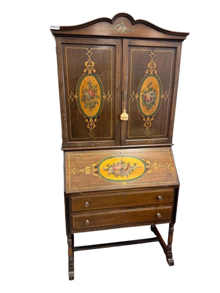 VINTAGE SECRETARY'S DESK WITH HAND EMBELISHED FLORAL DOORS MFD. BY ROCKFORD CHAIR & FURNITURE CO.: ONE-PIECE SECRETARY'S DESK WITH FLORAL AND LEAF DESIGN, DOVETAIL CONSTRUCTED DRAWERS, INCLUDES KEY, ORIGINAL LABEL ON THE BACK 33 1/2" X 16" X 74"