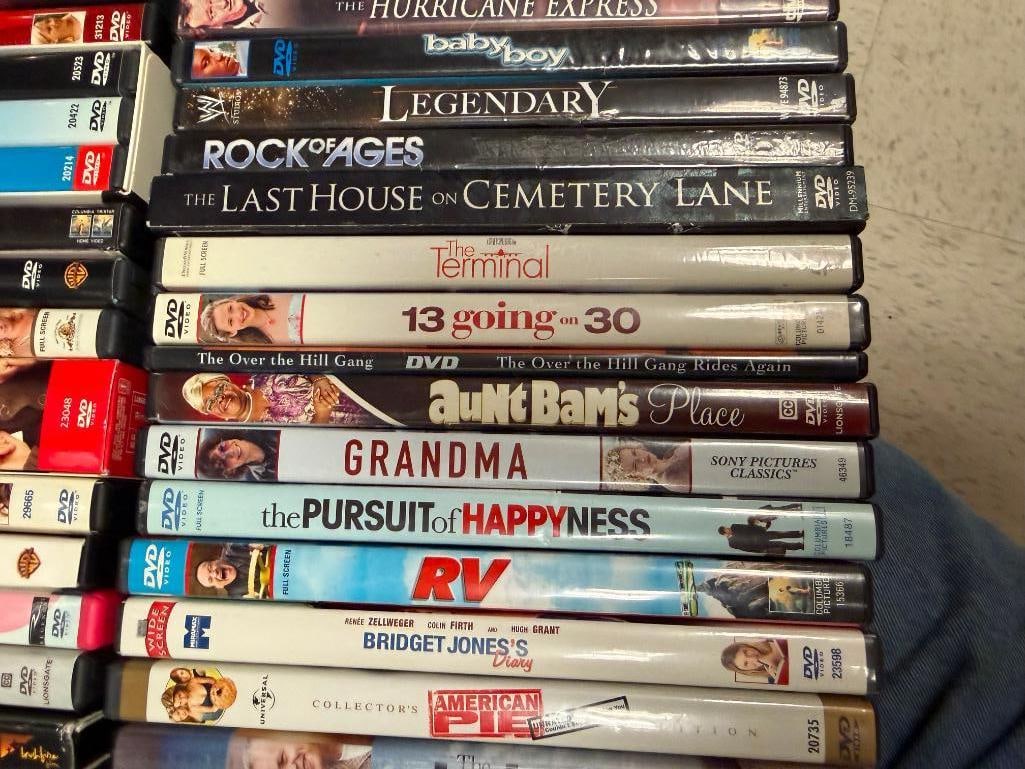 MORE THAN 90 ASSORTED DVDS - 5