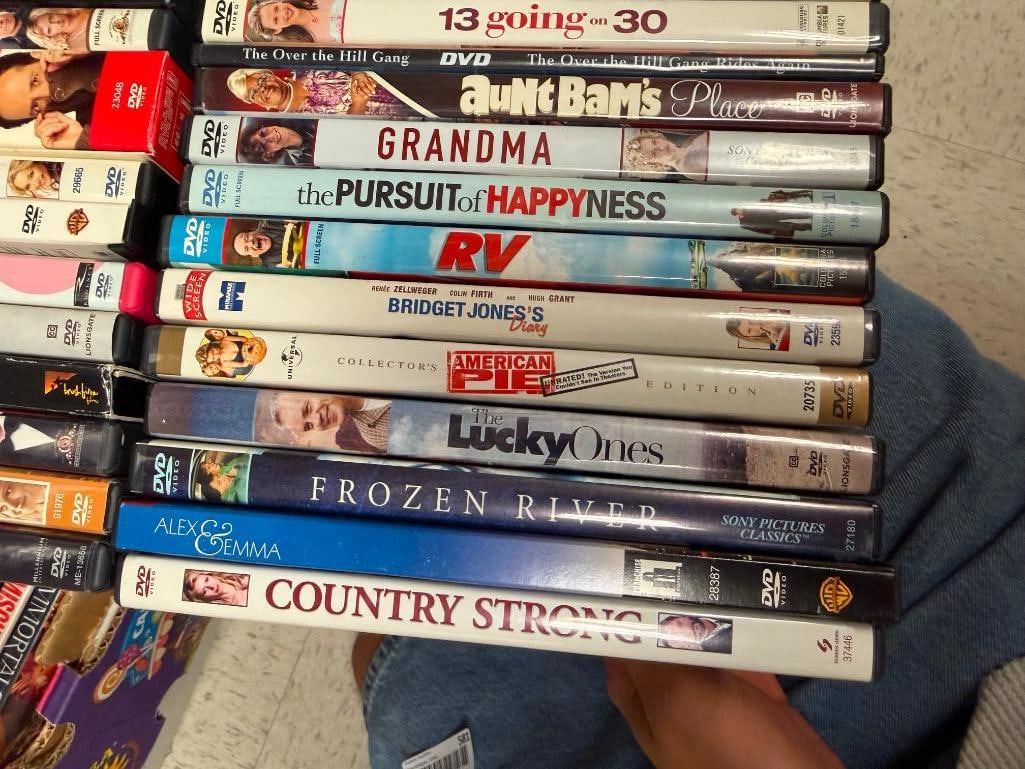 MORE THAN 90 ASSORTED DVDS - 6