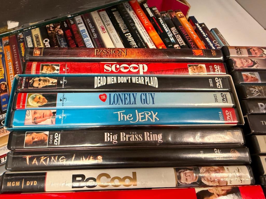 MORE THAN 90 ASSORTED DVDS - 7