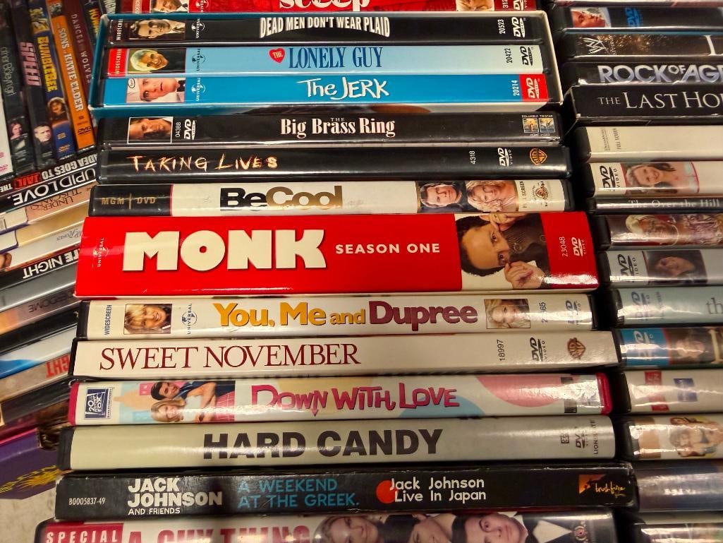 MORE THAN 90 ASSORTED DVDS - 8