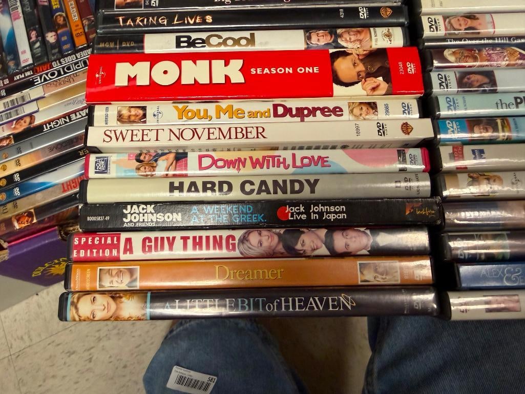 MORE THAN 90 ASSORTED DVDS - 9