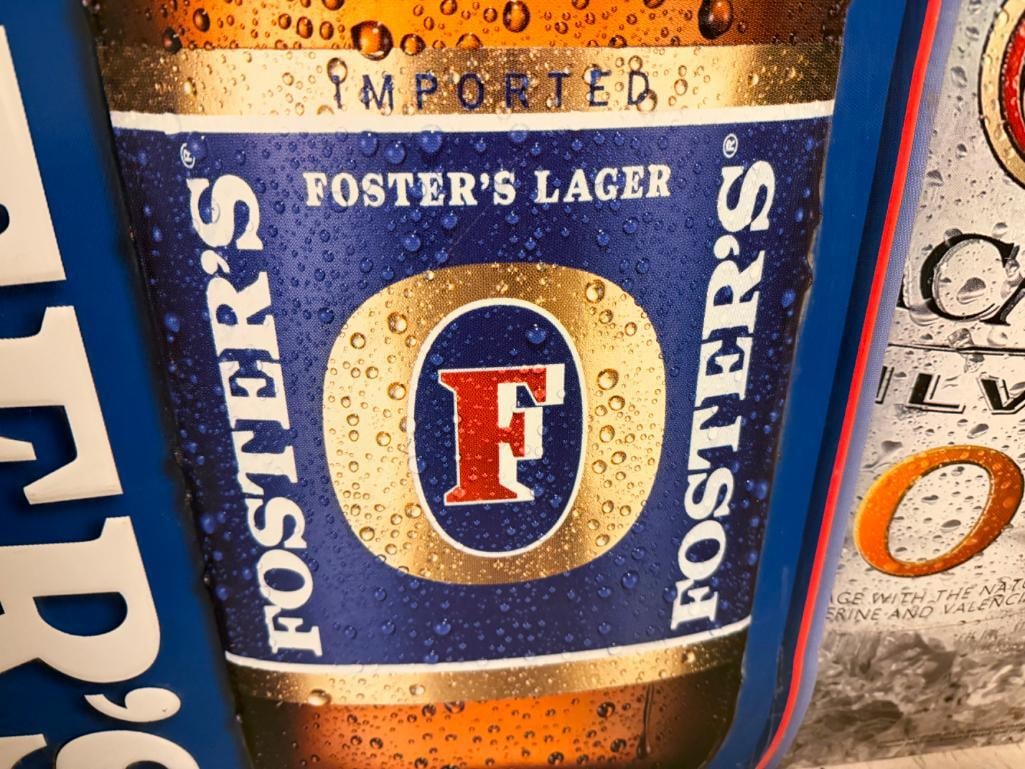 THREE BEER SIGNS INCLUDING FOSTERS TIN SIGN, BACARDI SILVER TIN SIGN, AND VINTAGE RHEINGOLD LAGER - 6