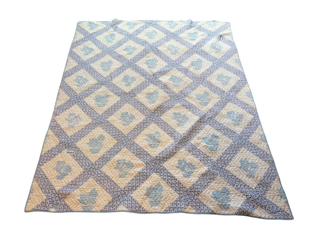 VINTAGE HAND CRAFTED WHITE GINGHAM QUILT WITH FLORAL BLOCKS: EDGES SHOW FRAYING 63" X 75"