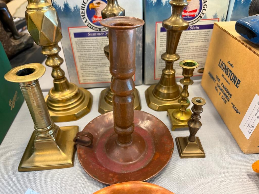 COLLECTION OF COPPER AND BRASS CANDLESTICK HOLDERS - 8