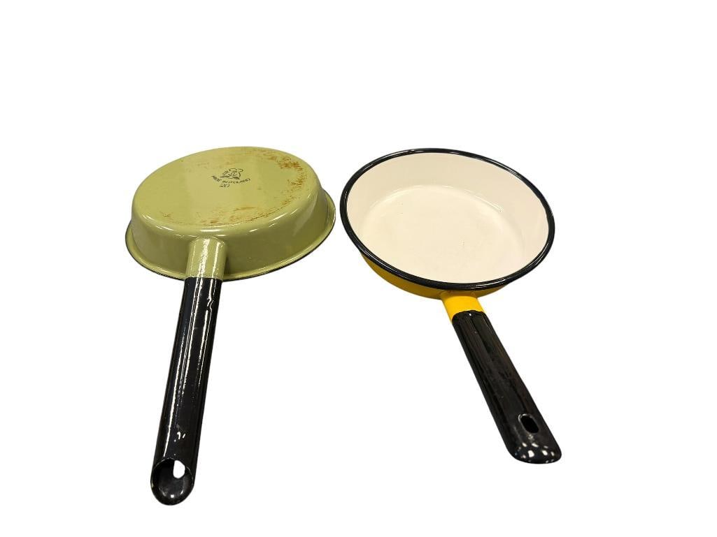 VINTAGE HUTA SILESIA POLISH MADE ENAMELED PANS CIRCA 1970'S: YELLOW AND GREEN ENAMELED PANS WITH BLACK HANDLES, BOTH MARKED ON THE BOTTOM, SIGNS OF WEAR SHOWN 8" ROUND