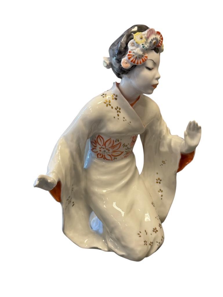 1950'S ROSENTHAL JOY KIM HAND PAINTED GEISHA PORCELAIN FIGURINE DESIGNED BY LORE FRIEDRICH GRONAU: DESIGNED IN 1956, DESIGNED AFTER AN ASIAN ACTRESS, NO. 5069, MADE IN GERMANY, MARKED ON THE BOTTOM, NO DAMAGE OR REPAIRS 10" H