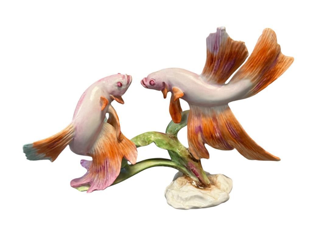 VINTAGE ROSENTHAL FIGHTING FISH (KAMPFENDE FISCHE) PORCELAIN FIGURINE DESIGNED BY FRITZ HEIDENREICH: MADE BETWEEN 1957-1970, DEPICTS VIBRANT FIGHTING FISH DUO, SIGNED BY THE ARTIST ON THE BOTTOM OF ONE OF THE LEAVES, FIGURE NO. #1900, MARKED ON THE BOTTOM, MADE IN GERMANY, NO DAMAGE OR REPAIRS 10 1/2