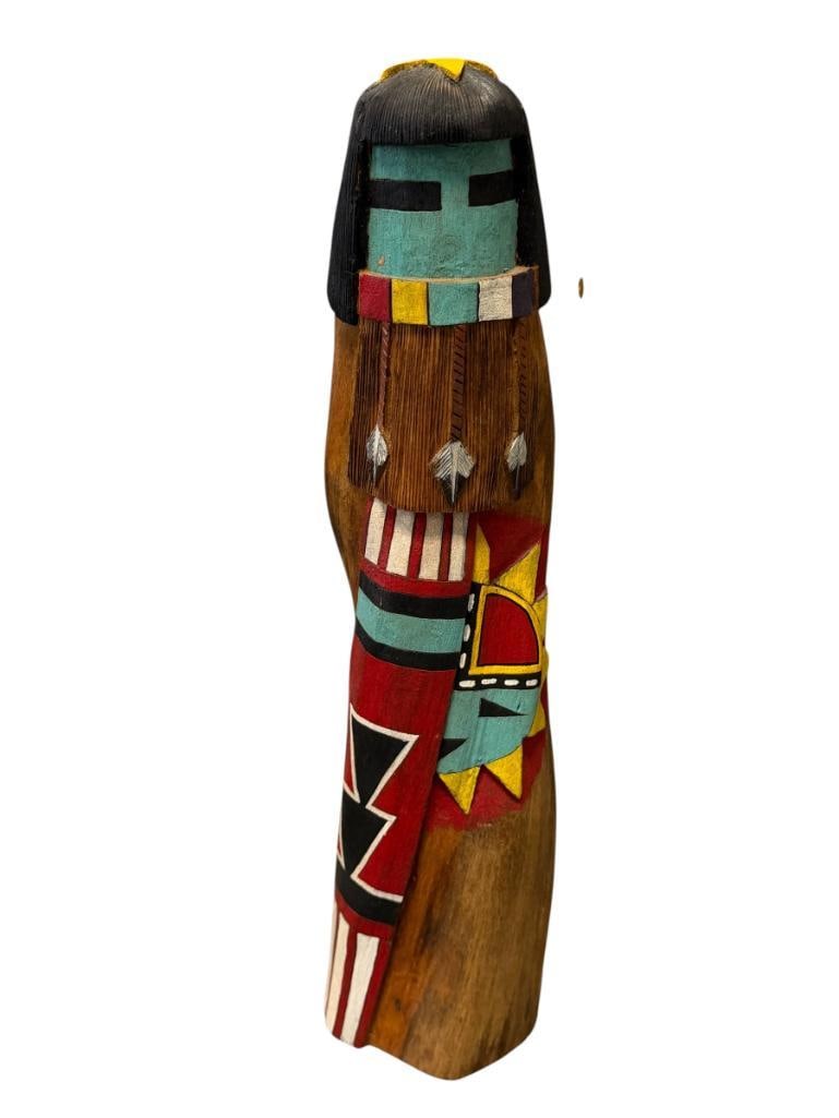 VINCENT LONG 20TH CENTURY NAVAJO ARTIST HAND-CARVED KACHINA DOLL MADE FROM COTTONWOOD ROOT: TALL KACHINA DOLL NAMED LONG HAIR, DECORATED WITH CARVINGS AND HAND PAINTED ACCENTS AND DESIGN, SIGNED ON THE BOTTOM BY THE ARTIST, DATED 1975 16" H