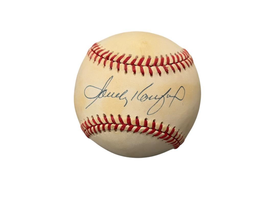 HALL OF FAMER SANDY KOUFAX AUTOGRAPHED BASEBALL AUTHENTICATED BY JSA WITH CERTIFICATE: SANDY KOUFAX (B. 1935) 7X ALL-STAR, 4X WORLD SERIES CHAMPION, 3X CY YOUNG AWARD WINNER, HALL OF FAME INDUCTEE 1972 BALL IS SIGNED IN BLUE INK, INCLUDES CERTIFICATE BY JSA, CERTIFICATE NO. YY94353
