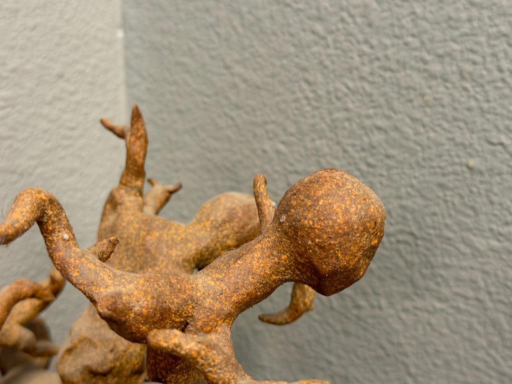 ABSTRACT CLAY SCULPTURE OF INTERTWINED FIGURES ON A ROUGH / NATURAL STONE BASE - 4
