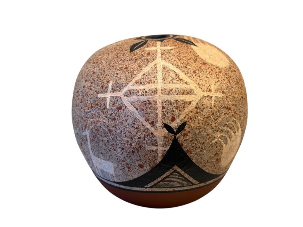 ZIA PUEBLO NEW MEXICO POLYCHROME HAND CRAFTED SEED POT WITH PETROGLYPHS DESIGN SIGNED "R.A.": ROUND CLAY SEED POT WITH PETROGLYPHS DESIGN, SIGNED ON THE BOTTOM, NO CRACKS OR CHIPS 4" H