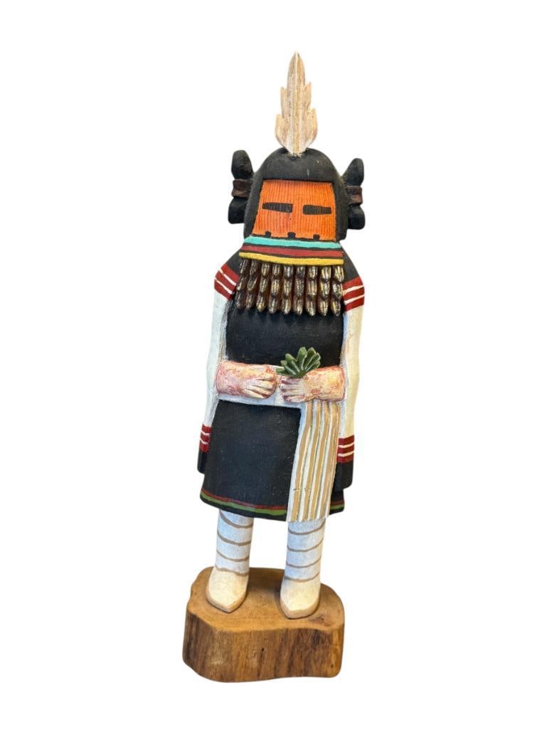 LARRY LACAPA HOPI NATIVE AMERICAN HAND CRAFTED COTTONWOOD KACHINA DOLL WALPI, ARIZONA: HAND CARVED / HAND PAINTED HOPI KACHINA DOLL MOUNTED ON WOOD SLAB BASE, SIGNED ON THE BOTTOM, FEATHER ON HEAD HAS BEEN PREVIOUSLY REPAIRED 11" H