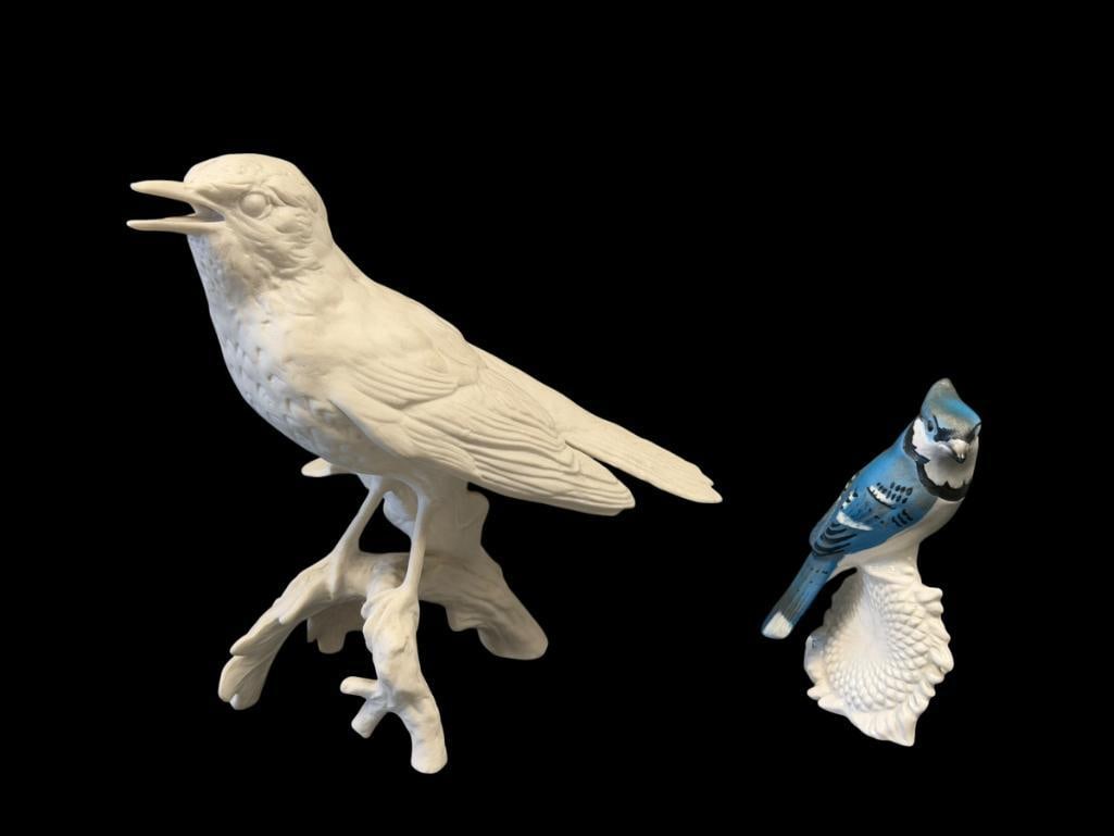 GOEBEL BISQUE PORCELAIN SONG THRUSH BIRD CV115 AND GOEBEL BLUE JAY ON SUNFLOWER 38527: BOTH FIGURINES HAVE NO DAMAGE OR REPAIRS, MADE IN GERMANY 3 1/2" AND 6" H