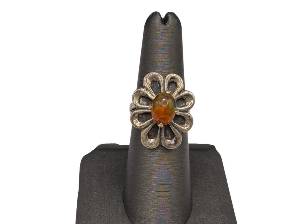 VINTAGE STERLING SILVER TAXCO DESIGN MEXICAN OPAL RING: FEATURING OVAL CABOCHON OPAL IN FLORAL SETTING, MARKED "TAXCO" SIZE 6, 7/8" FRONT, 8MM OPAL, 6.37 GRAMS