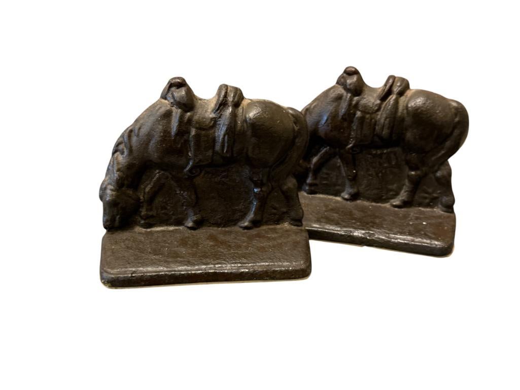 PAIR OF VINTAGE CAST IRON HEAVY BOOKENDS OF A SADDLED HORSE CIRCA 1920'S - 1930'S: 4 1/2" H