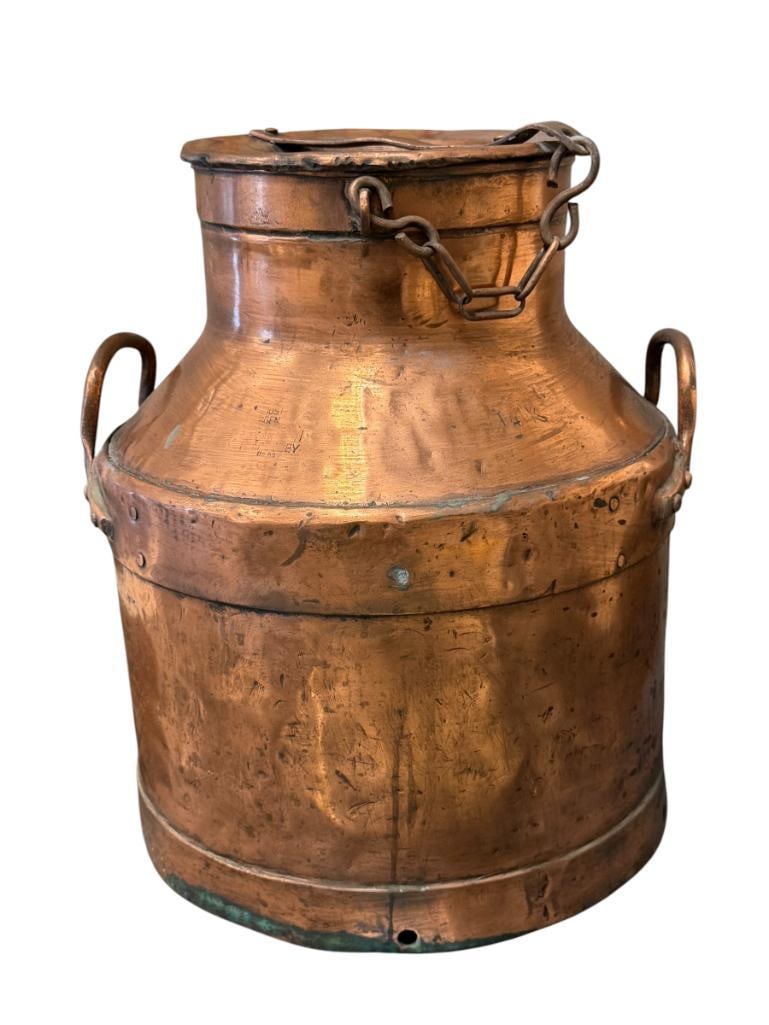 VINTAGE 50L COPPER DAIRY / MILK CAN WITH CHAINED COPPER TOP, MARKED: FEATURES DUAL HANDLES WITH COPPER TOP, DAIRY CAN IS MARKED, BUT STAMP IS FAINT AND UNABLE TO DECIPHER 17 1/2" H