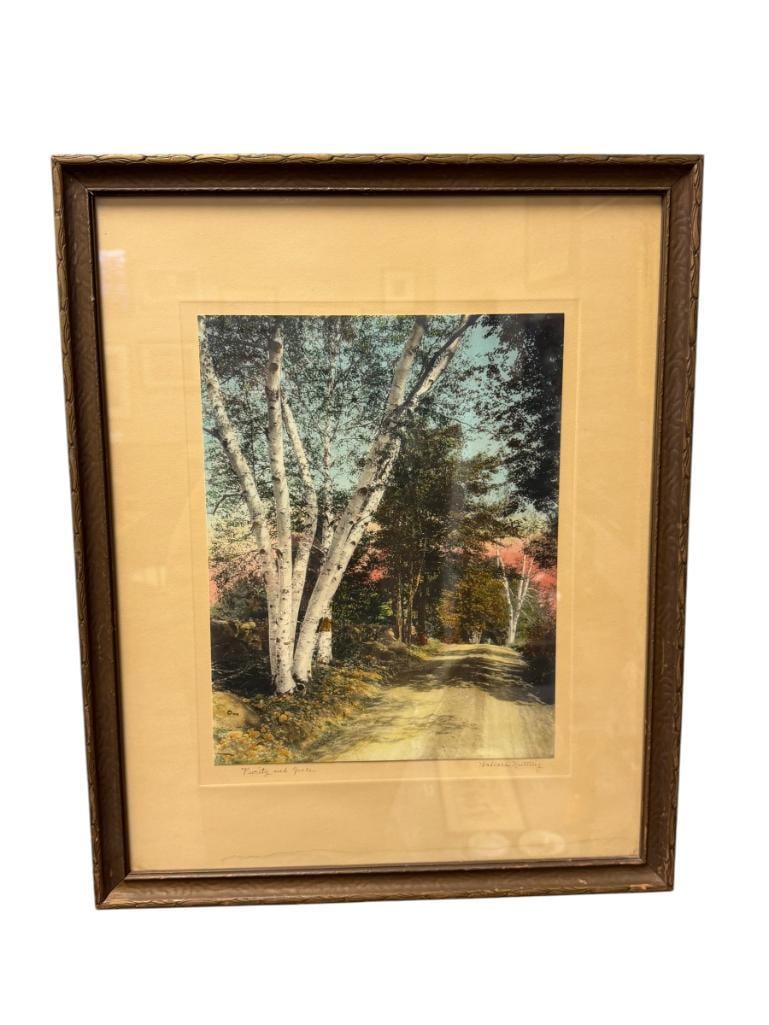 WALLACE NUTTING AMERICAN MINISTER / PHOTOGRAPHER HAND COLORED EARLY 20TH CENTURY PHOTOGRAPH: WALLACE NUTTING (1861-1941) WAS A FAMOUS PHOTOGRAPHER KNOWN FOR HIS LANDSCAPES OF NEW ENGLAND, ART IS TITLED PURITY AND GRACE, DEPICTS DIRT ROAD COVERED BY MATURE TREES, SIGNED LOWER RIGHT, FRAMED 18"