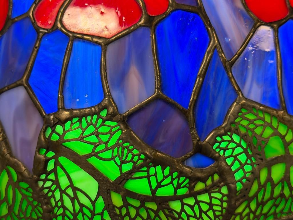 TIFFANY STYLE STAINED GLASS TABLE LAMP WITH PIERCED METAL OVERLAY CAST BRONZE TONED BASE - 12