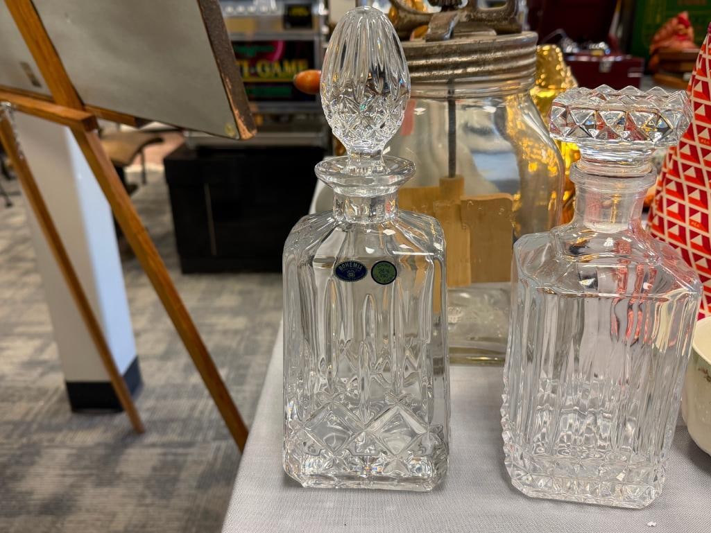 GLASS AND TWO CRYSTAL DECANTERS WITH STOPPERS - 10