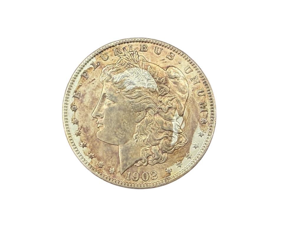 1902-O U.S. MORGAN SILVER DOLLAR AU TONED: 90% SILVER
