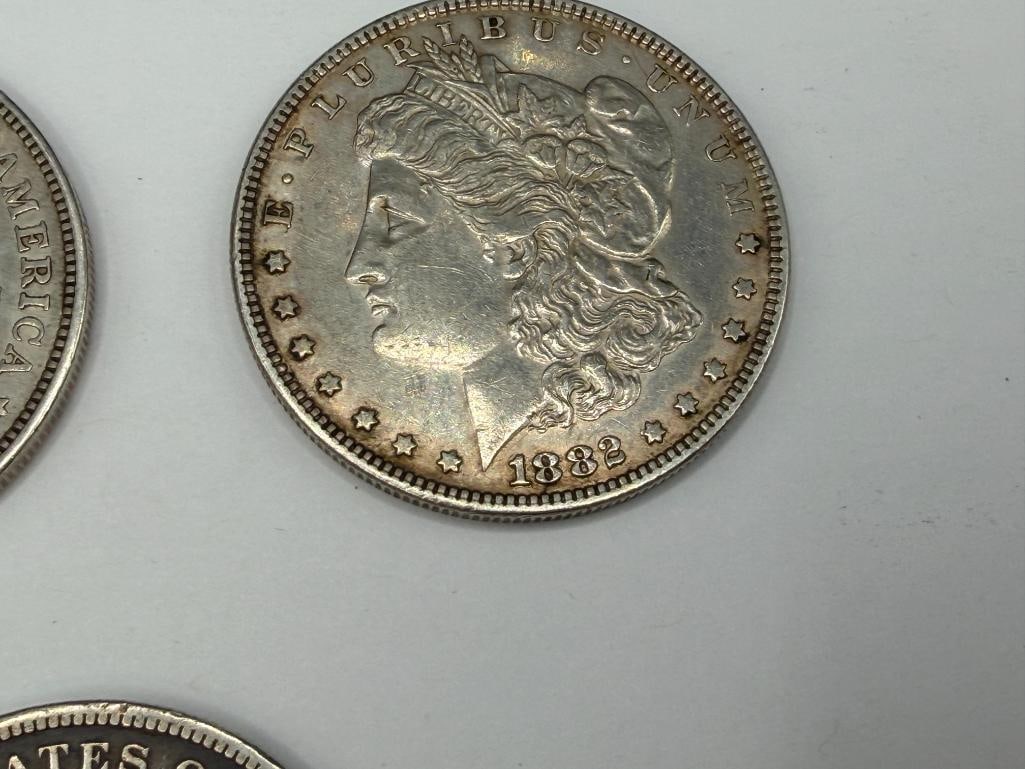 FIVE U.S. MORGAN SILVER DOLLARS FEATURING VARIOUS DATES AND MINT MARKS - 11