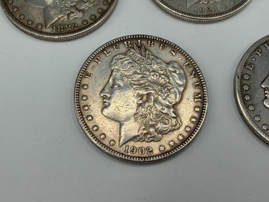 FIVE U.S. MORGAN SILVER DOLLARS FEATURING VARIOUS DATES AND MINT MARKS - 3